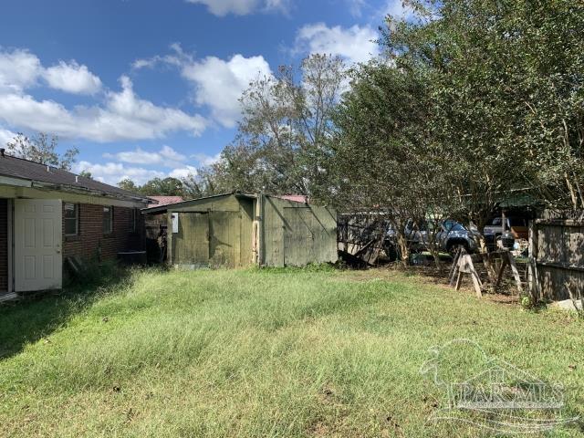 3281 Mason Road Walnut Hill, FL 32568 - Photo 11 of 41 a view of a house with a yard