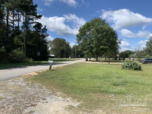 3281 Mason Road Walnut Hill, FL 32568 - Photo 2 of 41 a view of a garden