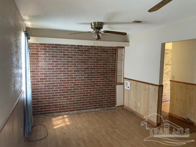 3281 Mason Road Walnut Hill, FL 32568 - Photo 30 of 41 a view of a livingroom with wooden floor