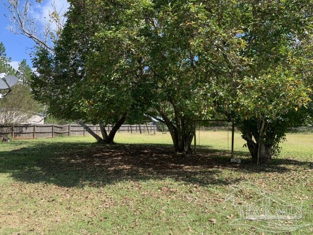 3281 Mason Road Walnut Hill, FL 32568 - Photo 8 of 41 a view of backyard with green space
