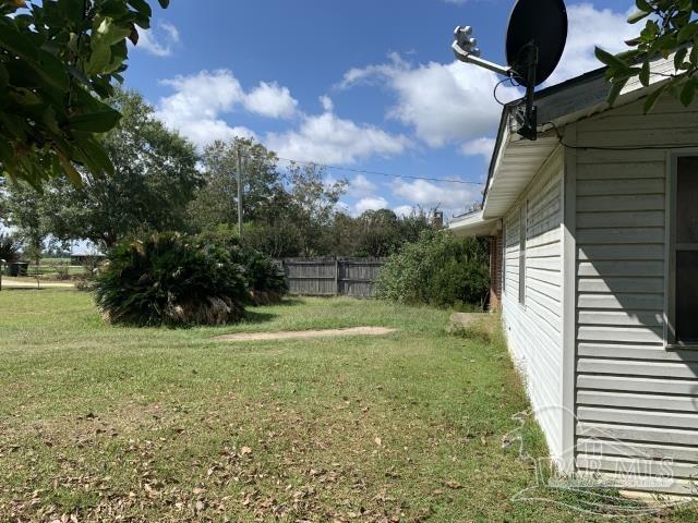 3281 Mason Road Walnut Hill, FL 32568 - Photo 10 of 41 a view of a backyard