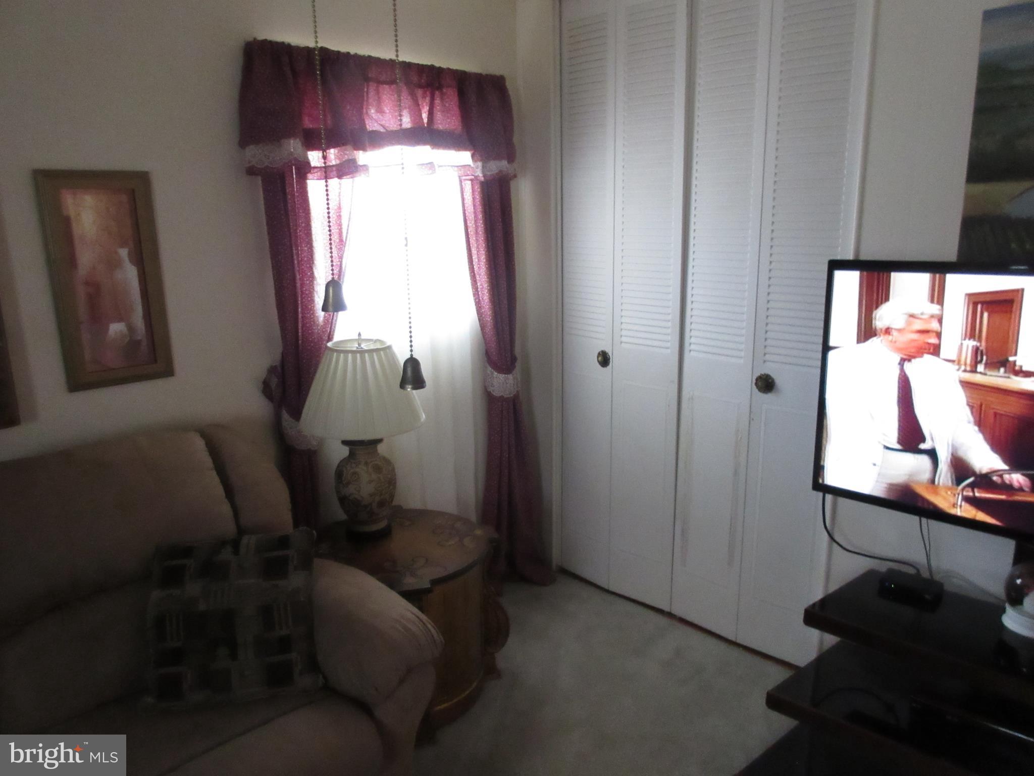 4786 Byron Road Baltimore, MD 21244 - Photo 16 of 30 a workspace room with furniture and window
