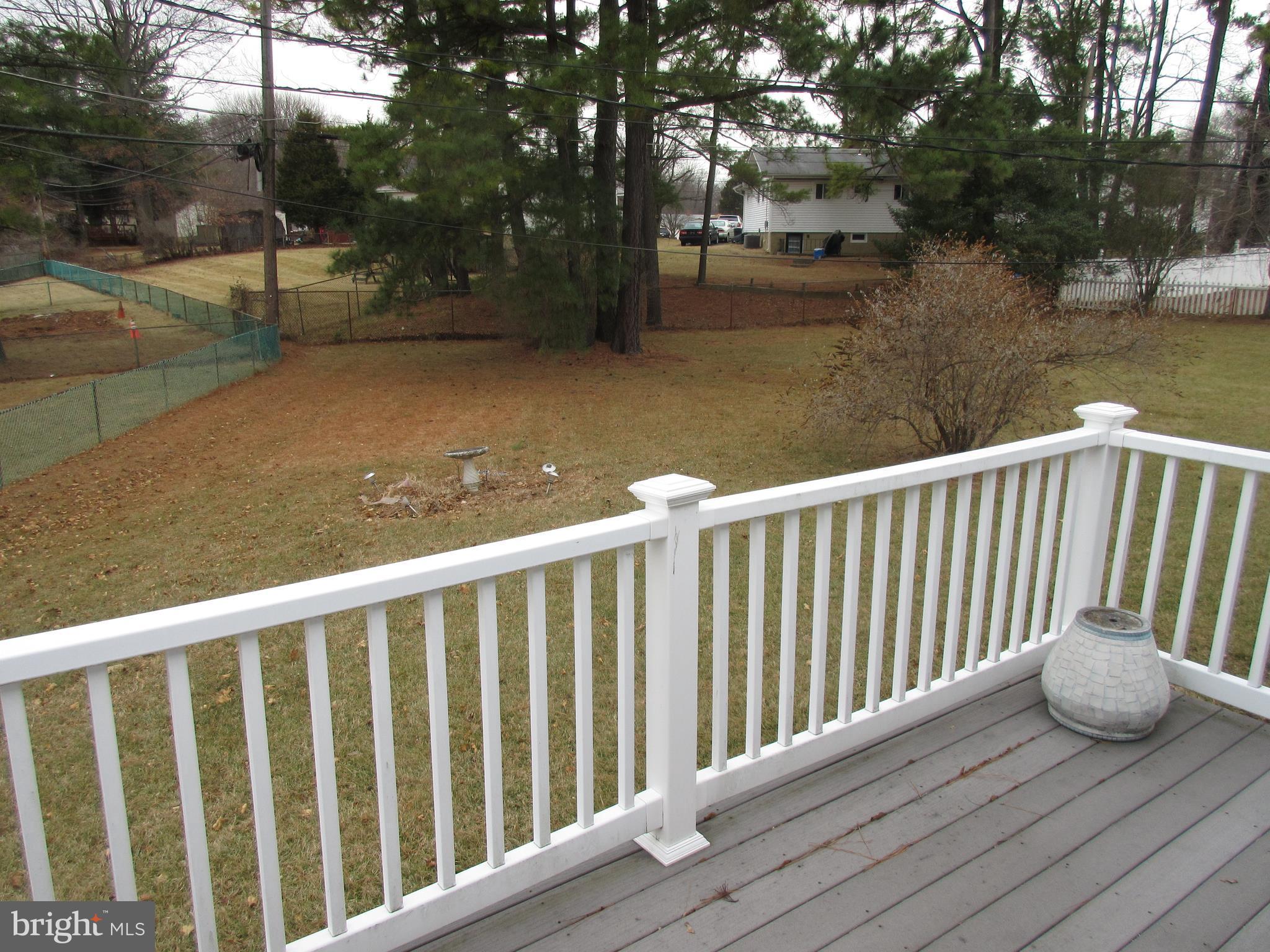 4786 Byron Road Baltimore, MD 21244 - Photo 27 of 30 a view of balcony with wooden floor and lake view