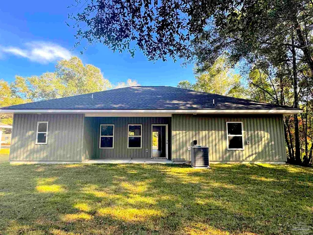 a view of a house with a swimming pool