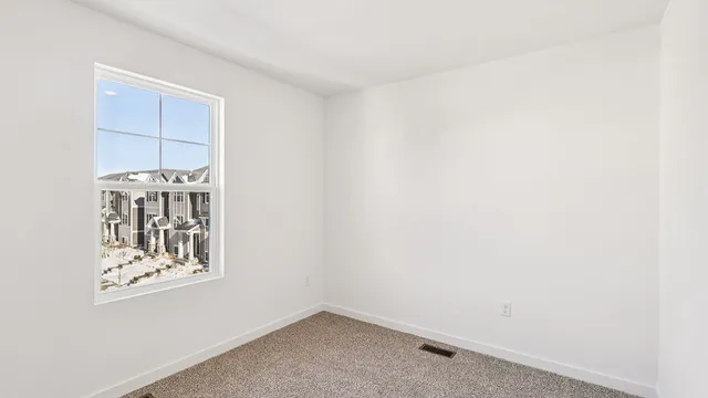 a view of a small space with racks on the wall