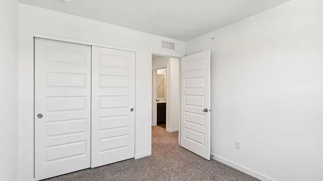 an empty room with closet