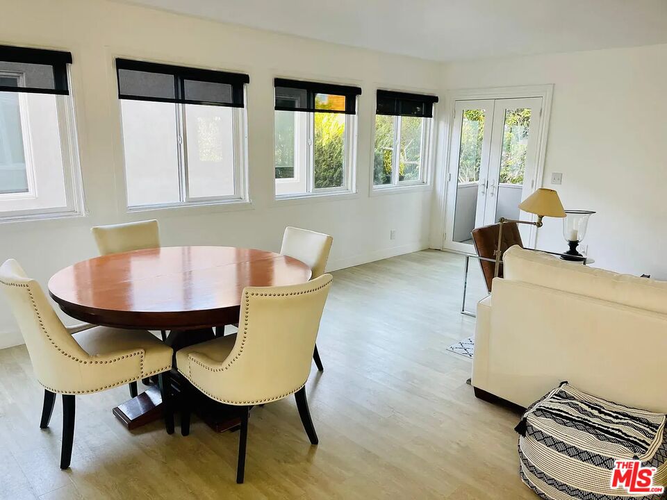 36 Anchorage Street, Unit 1 Venice, CA 90292 - Photo 11 of 32 a living room with furniture and a window
