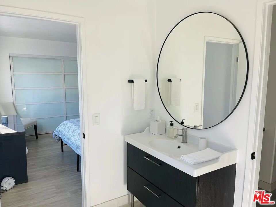 36 Anchorage Street, Unit 1 Venice, CA 90292 - Photo 22 of 32 a bathroom with a sink and a mirror