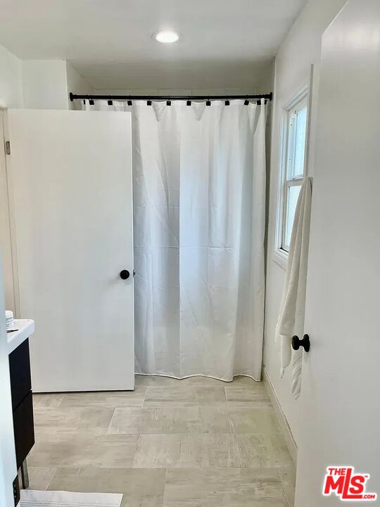 36 Anchorage Street, Unit 1 Venice, CA 90292 - Photo 23 of 32 a view of a closet with wooden floor