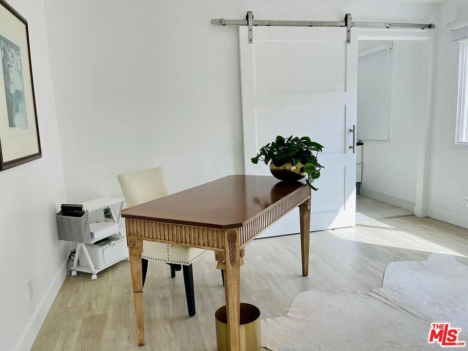 36 Anchorage Street, Unit 1 Venice, CA 90292 - Photo 25 of 32 a view of a livingroom with furniture and a potted plant