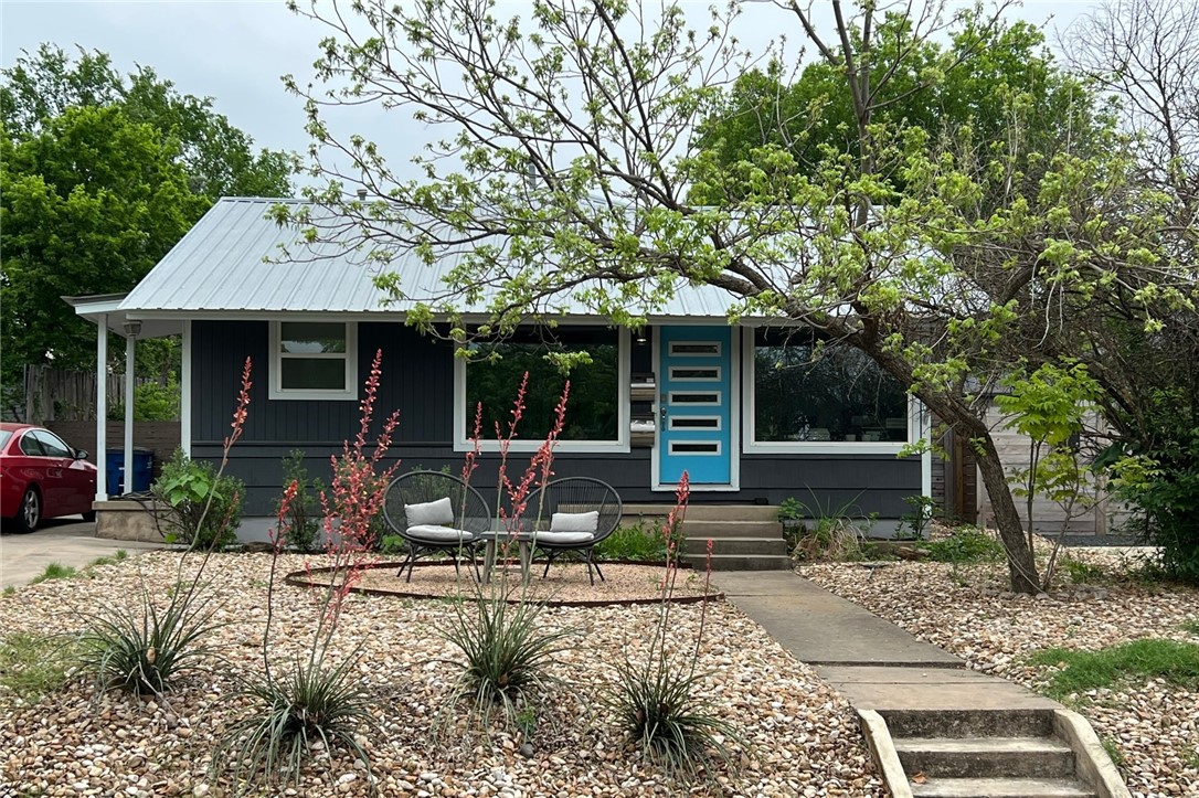 5509 Link Avenue, Unit A Austin, TX 78751 - Photo 1 of 1 a front view of a house with garden