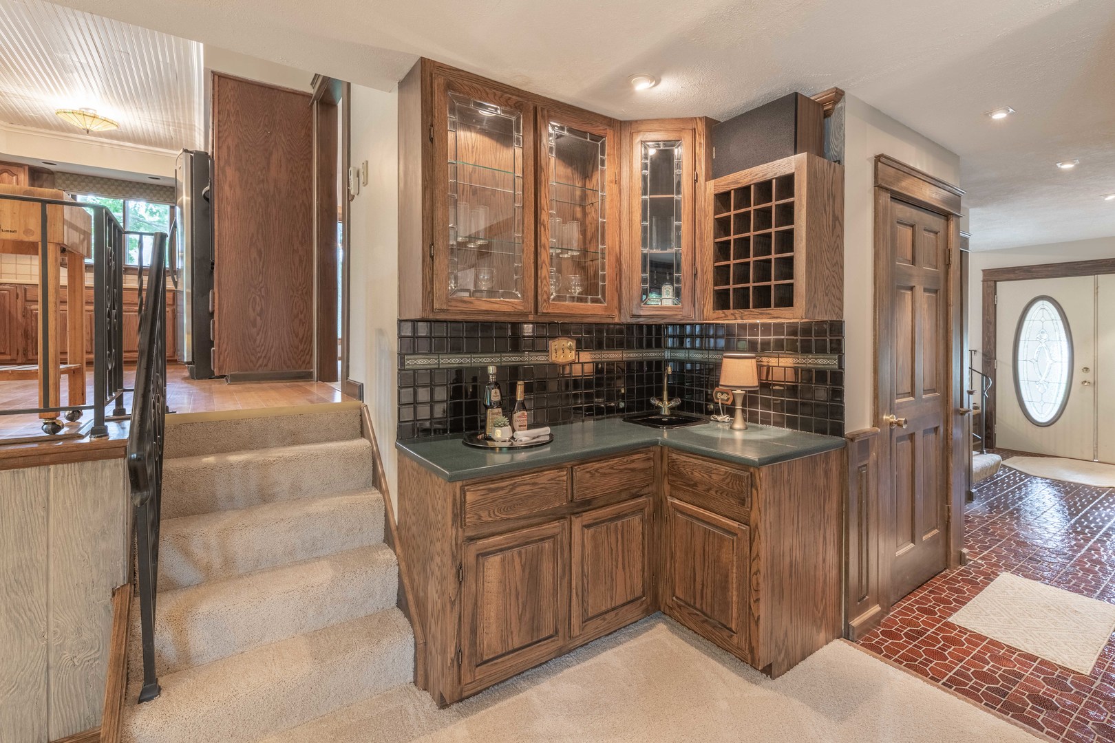 7N730 Sycamore Road St. Charles, IL 60175 - Photo 20 of 40 a kitchen with stainless steel appliances granite countertop a stove a sink and a microwave