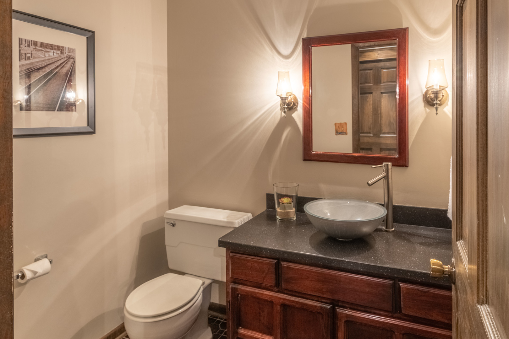 7N730 Sycamore Road St. Charles, IL 60175 - Photo 25 of 40 a bathroom with a toilet a sink and mirror