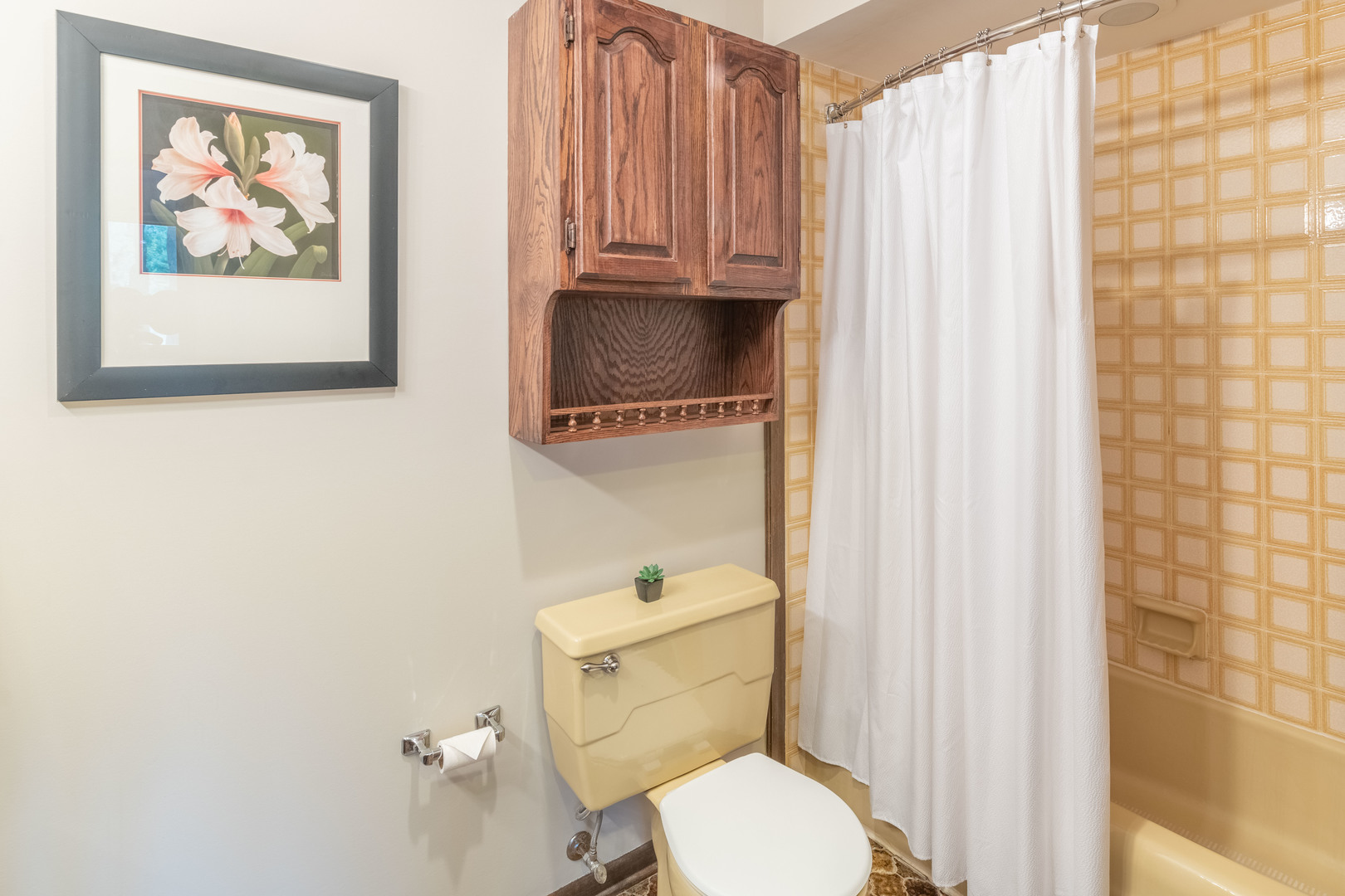 7N730 Sycamore Road St. Charles, IL 60175 - Photo 27 of 40 a white toilet sitting next to a shower curtain