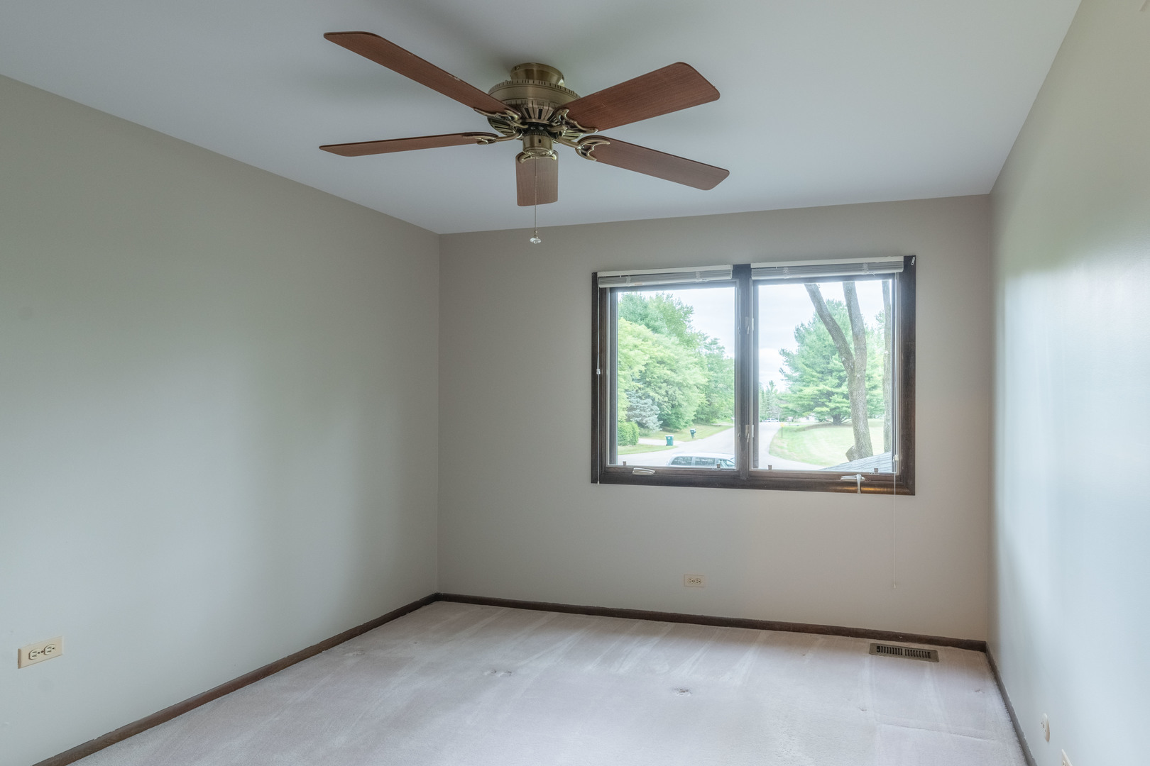 7N730 Sycamore Road St. Charles, IL 60175 - Photo 28 of 40 an empty room with a window and a fan