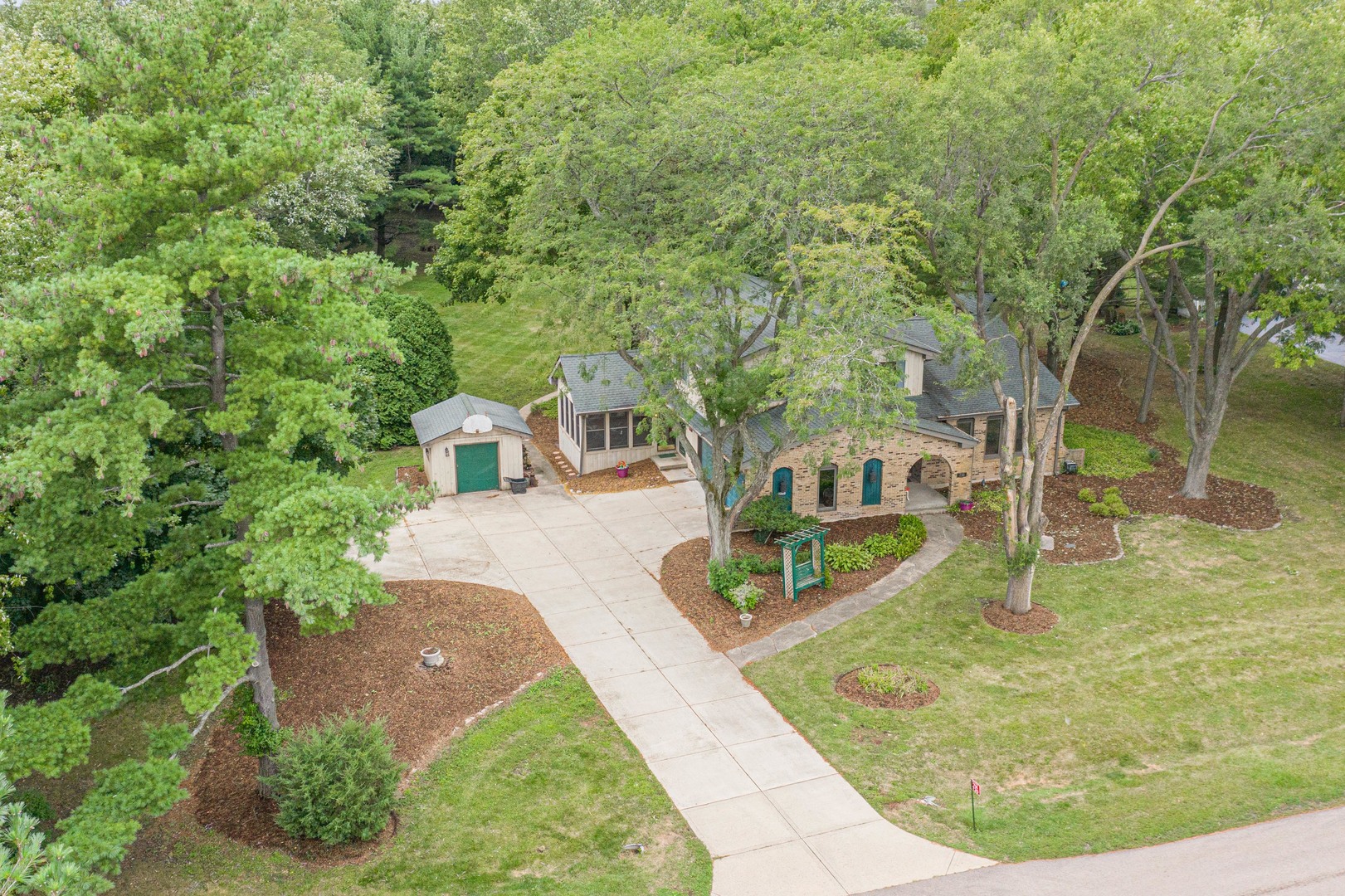 7N730 Sycamore Road St. Charles, IL 60175 - Photo 6 of 40 swimming pool view with a garden and seating
