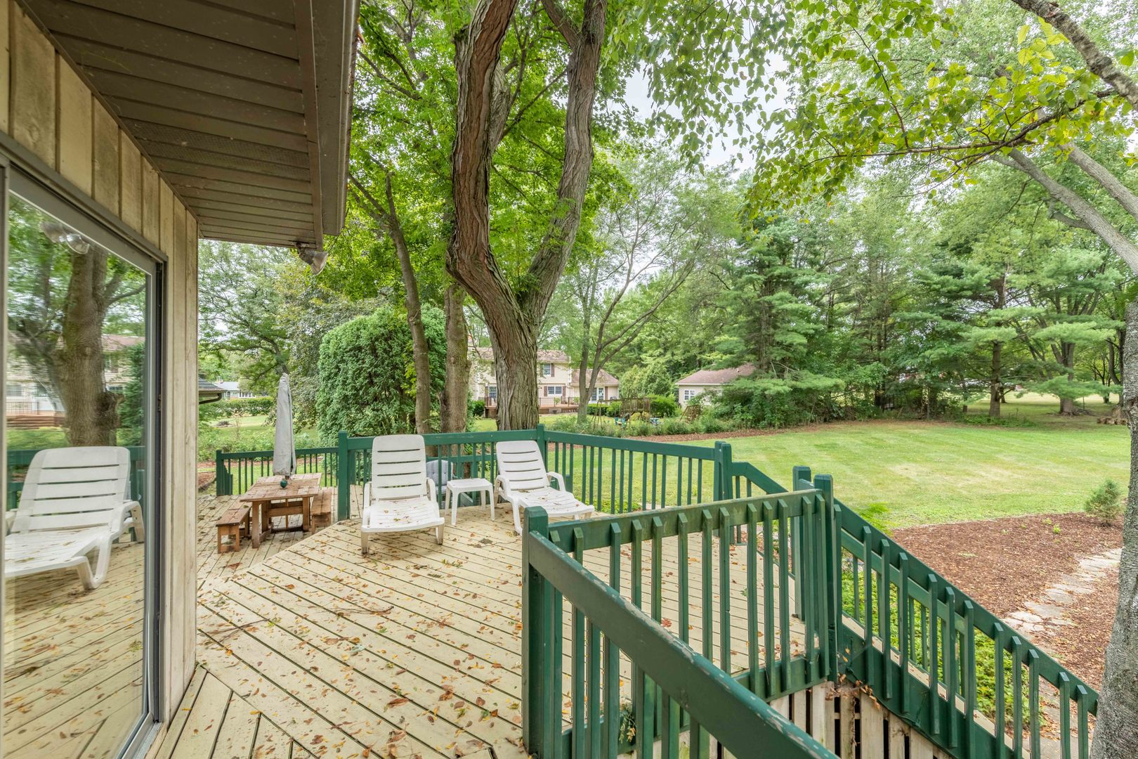 7N730 Sycamore Road St. Charles, IL 60175 - Photo 9 of 40 a view of a patio with two chairs next to a yard