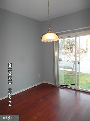 307 Sandy Spring Road Laurel, MD 20707 - Photo 16 of 18 a view of a room with window wooden floor and outside view