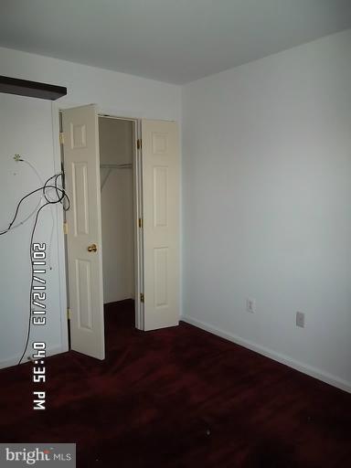 307 Sandy Spring Road Laurel, MD 20707 - Photo 8 of 18 wooden floor in a hall of a room