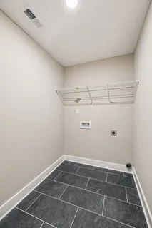 a view of a room with racks on the wall