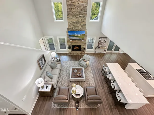 a bed room with a bed and a chandelier