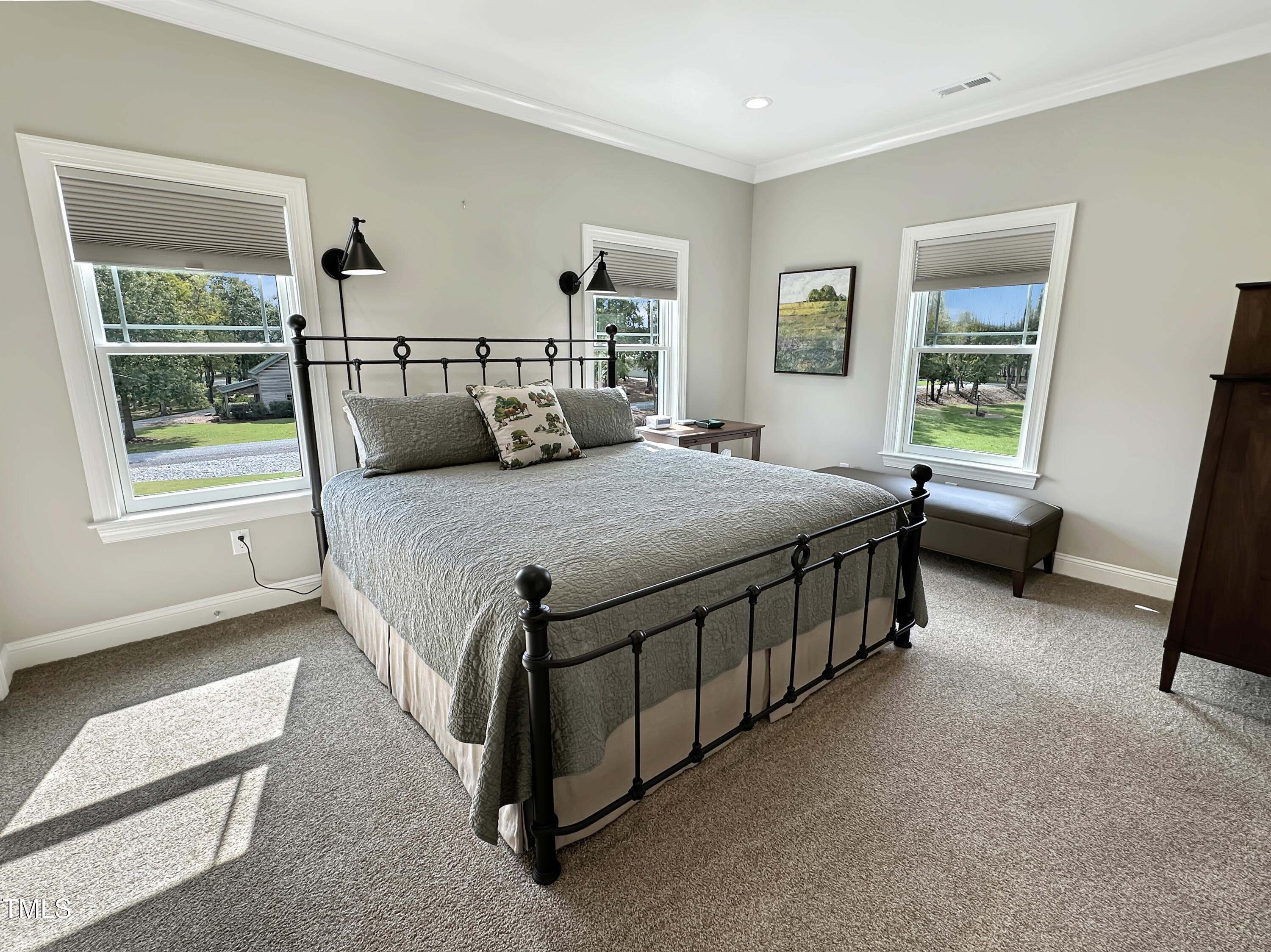 8589 McGhees Mill Road Semora, NC 27343 - Photo 27 of 67 a bedroom with a bed and a window