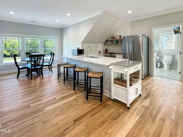 a bathroom with a shower and a window