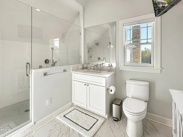 a view of a pathway with a yard