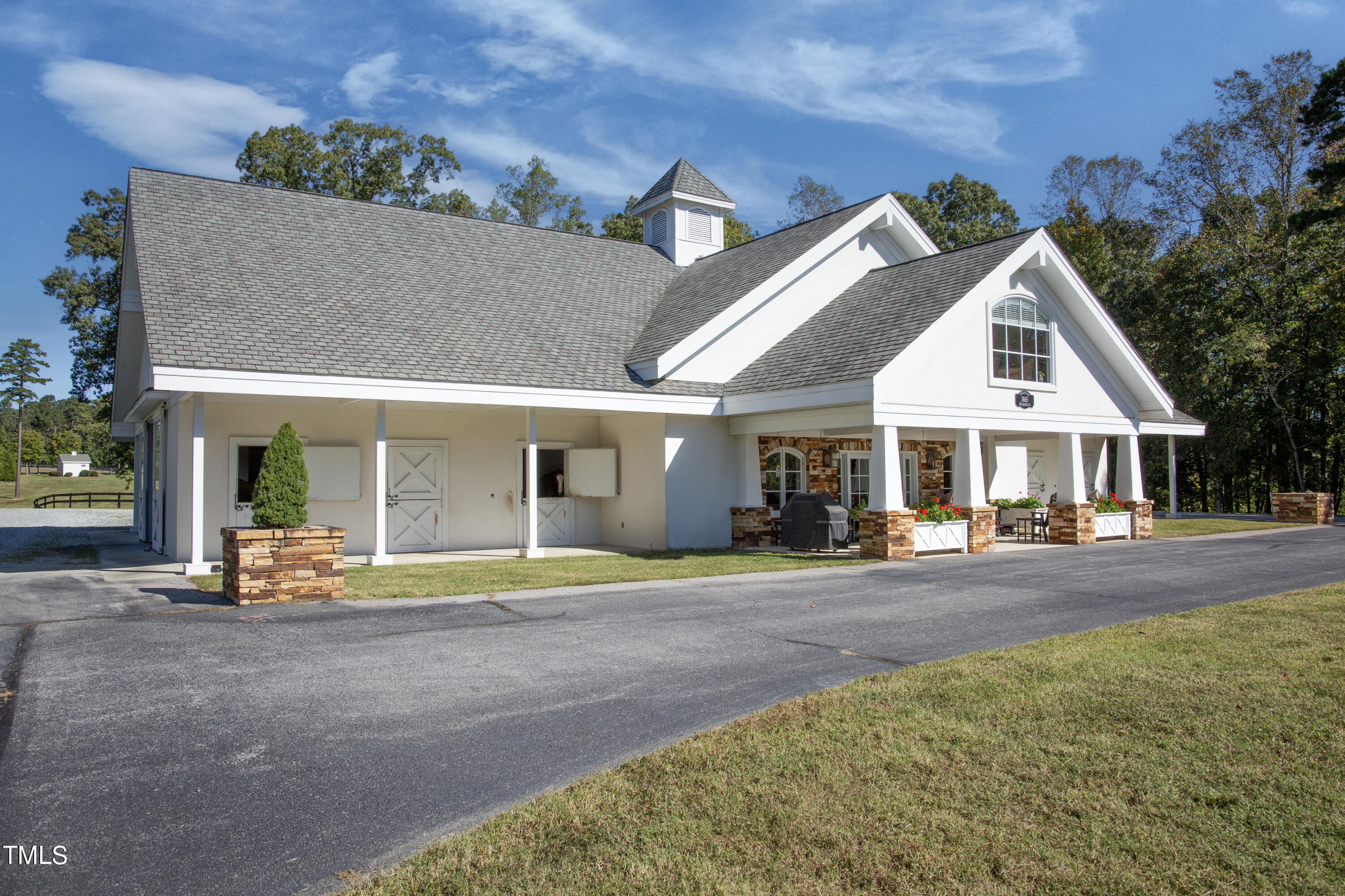 8589 McGhees Mill Road Semora, NC 27343 - Photo 57 of 67 a front view of a house with a porch