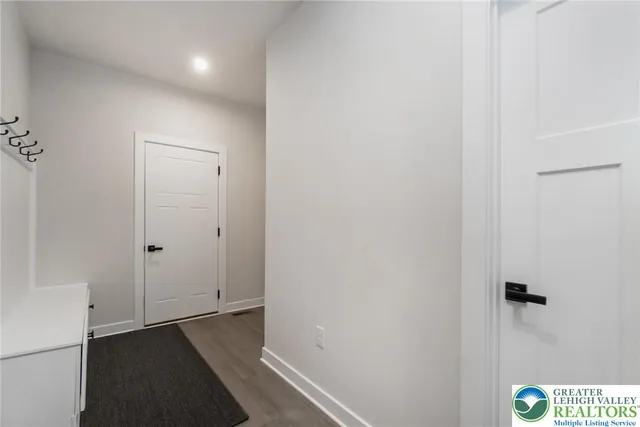 a utility room with closet dryer and washer