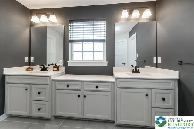 a living room with furniture and gym equipment