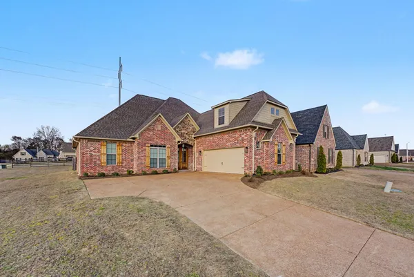 a view of kitchen with wooden floor and window