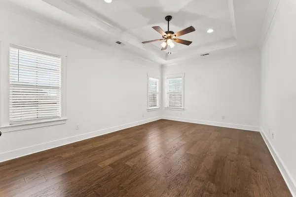 a view of room with wooden floor