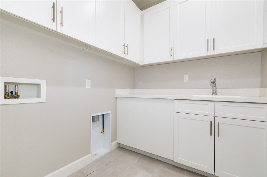 155 Blue Crystal Drive Walnut, CA 91789 - Photo 12 of 14 a view of cabinets and wooden floor
