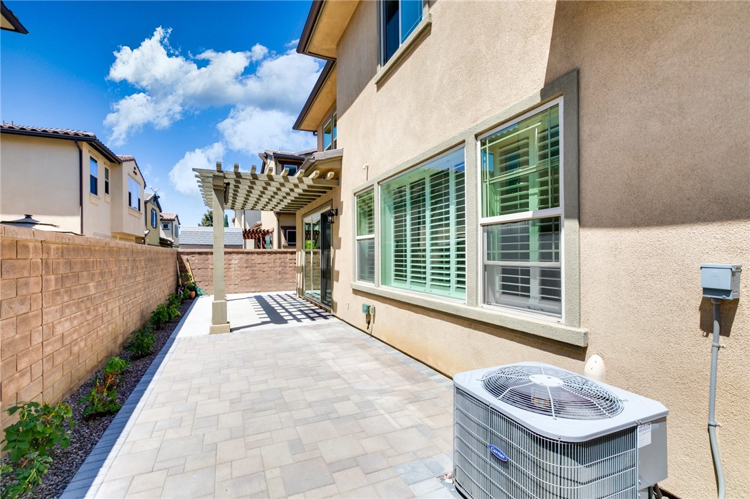 155 Blue Crystal Drive Walnut, CA 91789 - Photo 14 of 14 a building outdoor space with patio furniture and potted plants