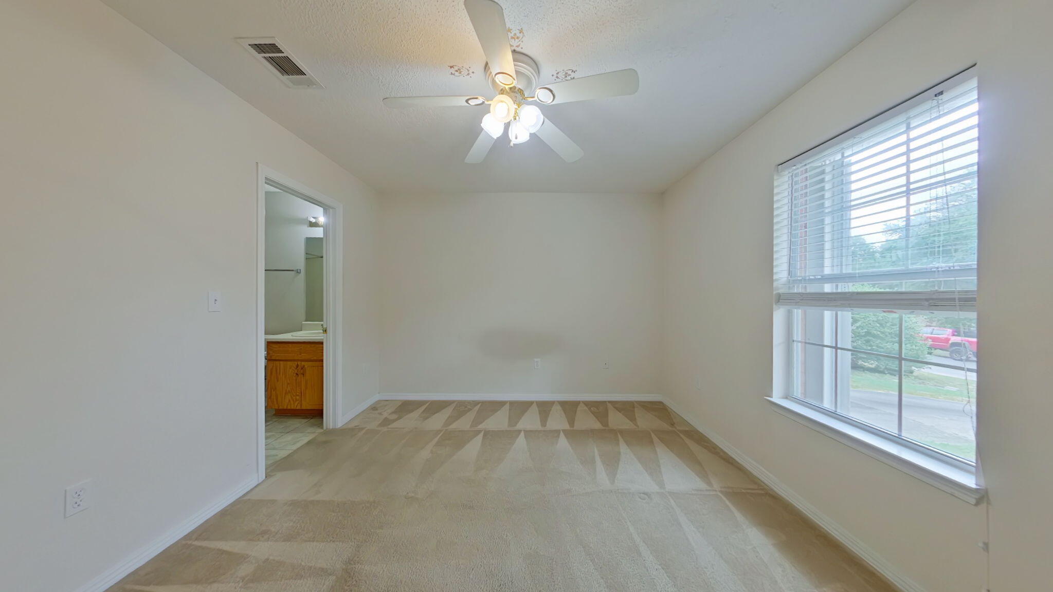117 Jeff Drive Crestview, FL 32536 - Photo 18 of 33 wooden floor in an empty room with a window
