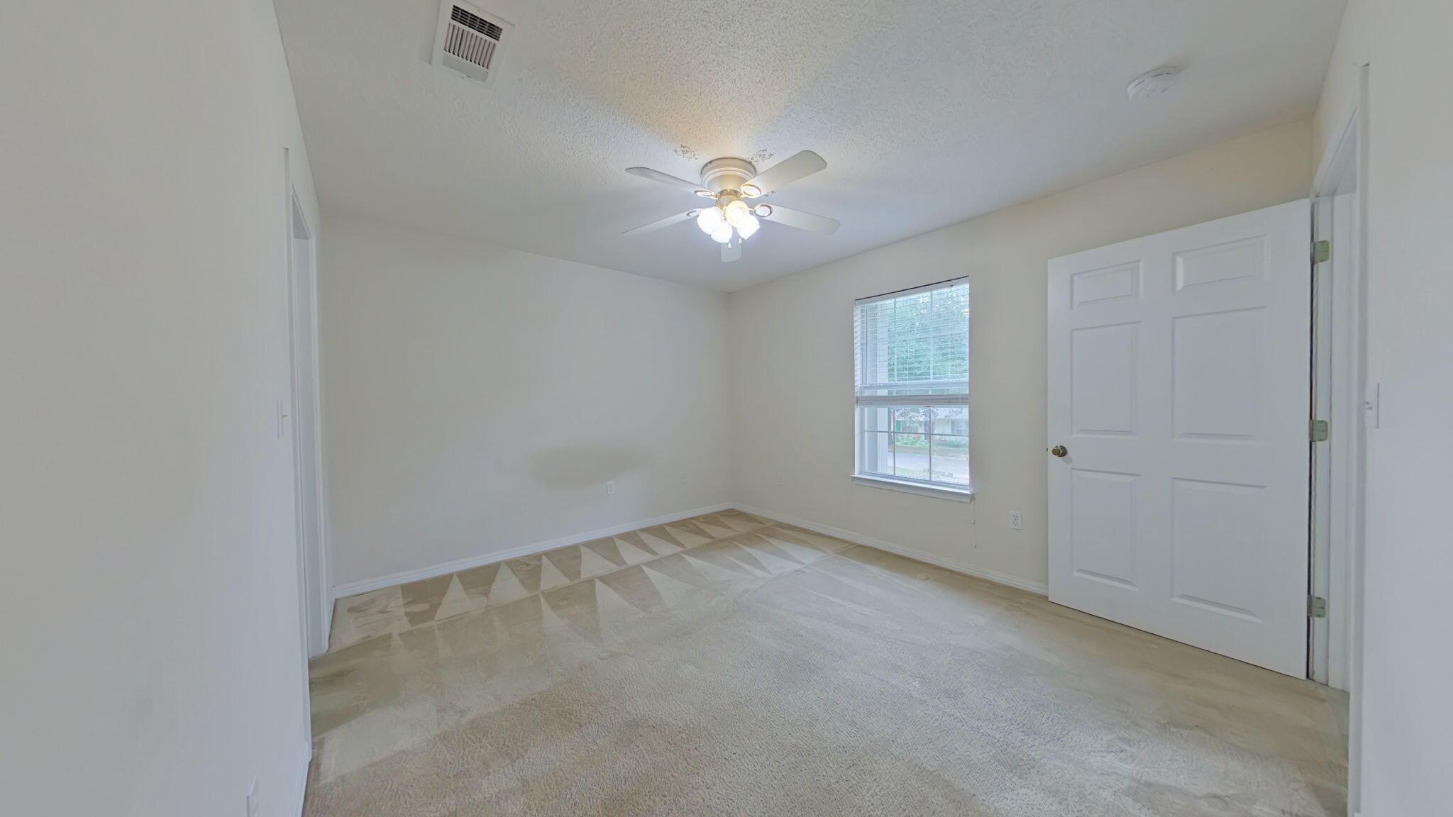 117 Jeff Drive Crestview, FL 32536 - Photo 20 of 33 a view of an empty room with a window