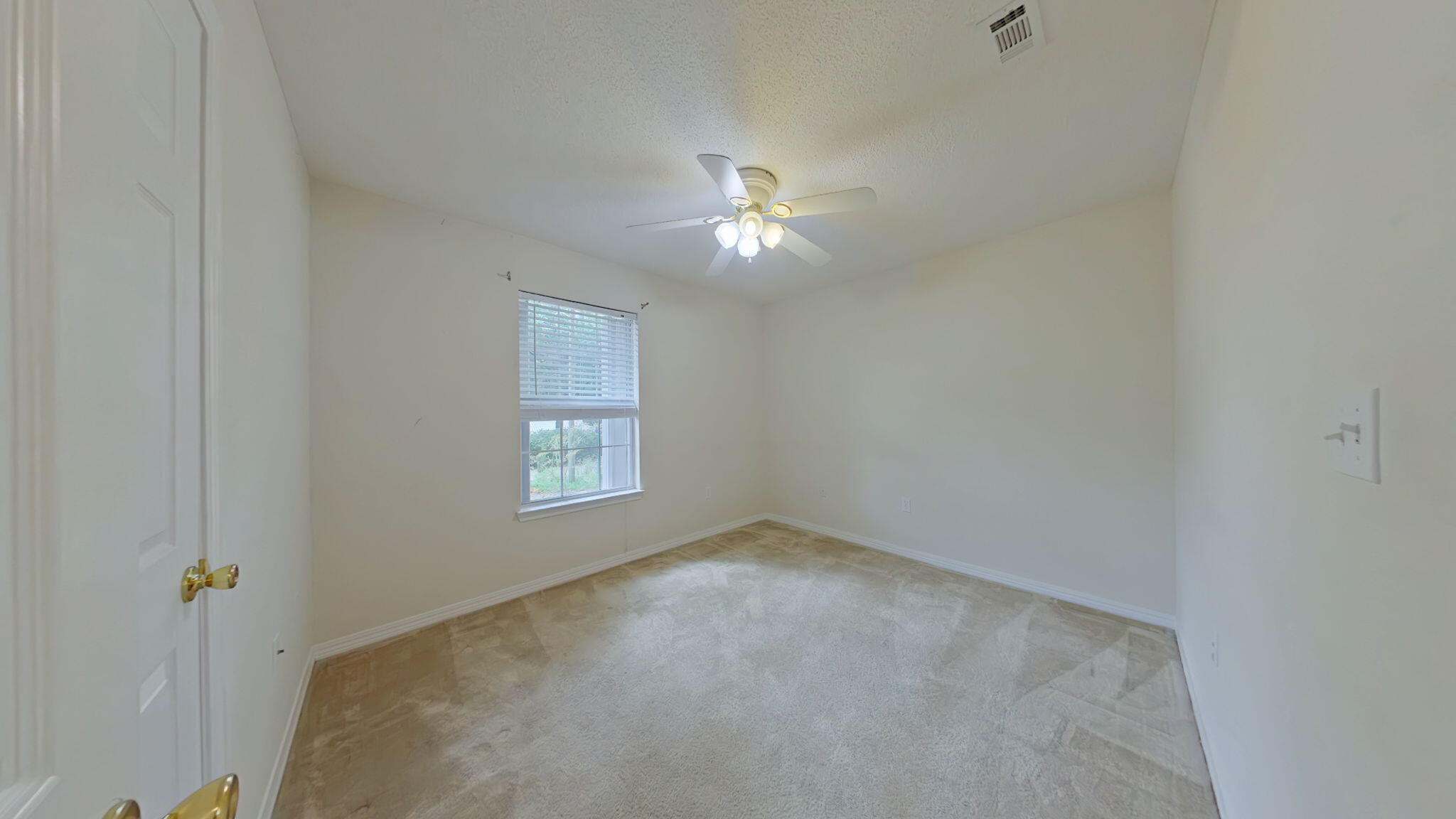 117 Jeff Drive Crestview, FL 32536 - Photo 22 of 33 a view of empty room with window
