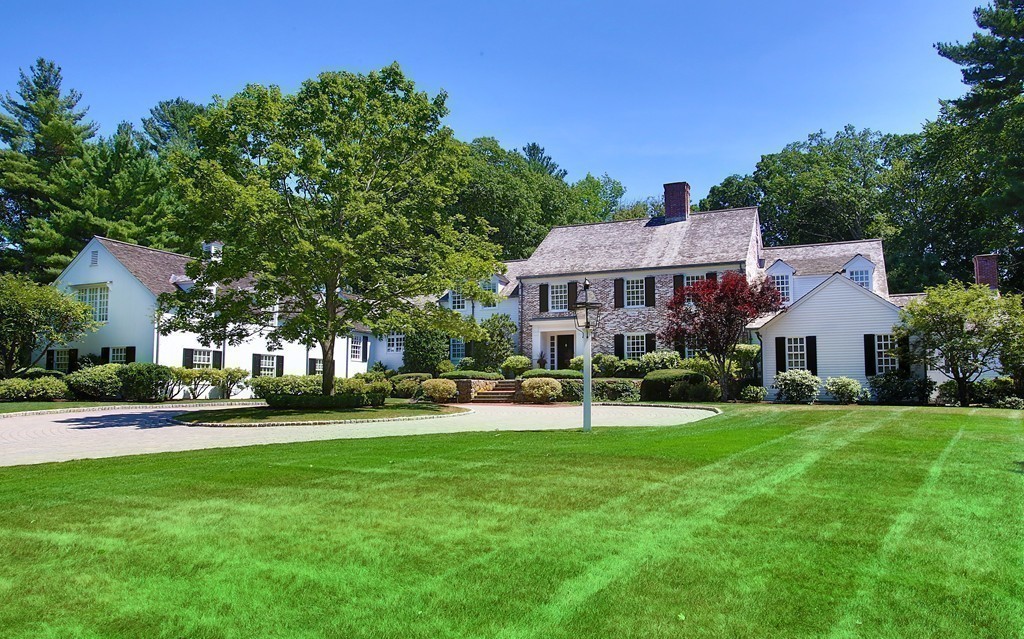 466 Glen Road Weston, MA 02493 - Photo 19 of 27 a front view of a house with a yard and trees