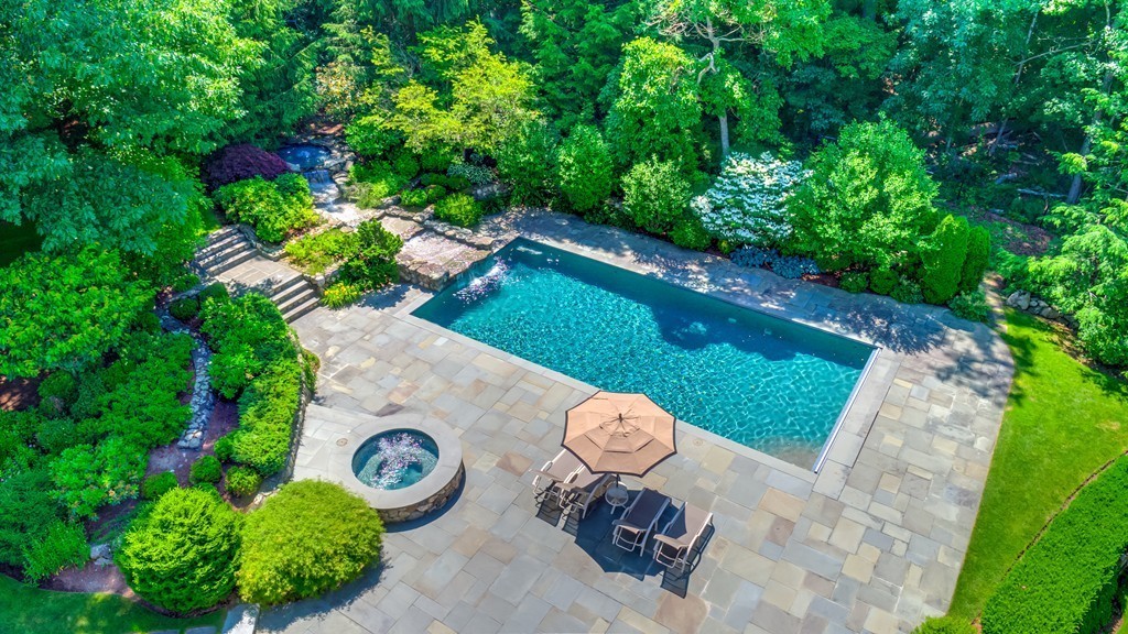 466 Glen Road Weston, MA 02493 - Photo 4 of 27 a view of outdoor space with deck and garden