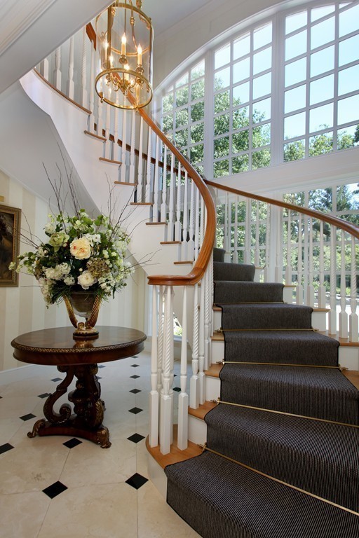 466 Glen Road Weston, MA 02493 - Photo 7 of 27 a view of entryway with a chandelier