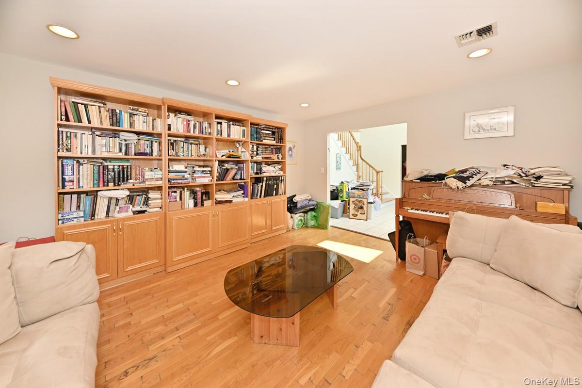 14 Roble Road Suffern, NY 10901 - Photo 13 of 30 Sitting room featuring recessed lighting, light wood-style flooring, and stairway