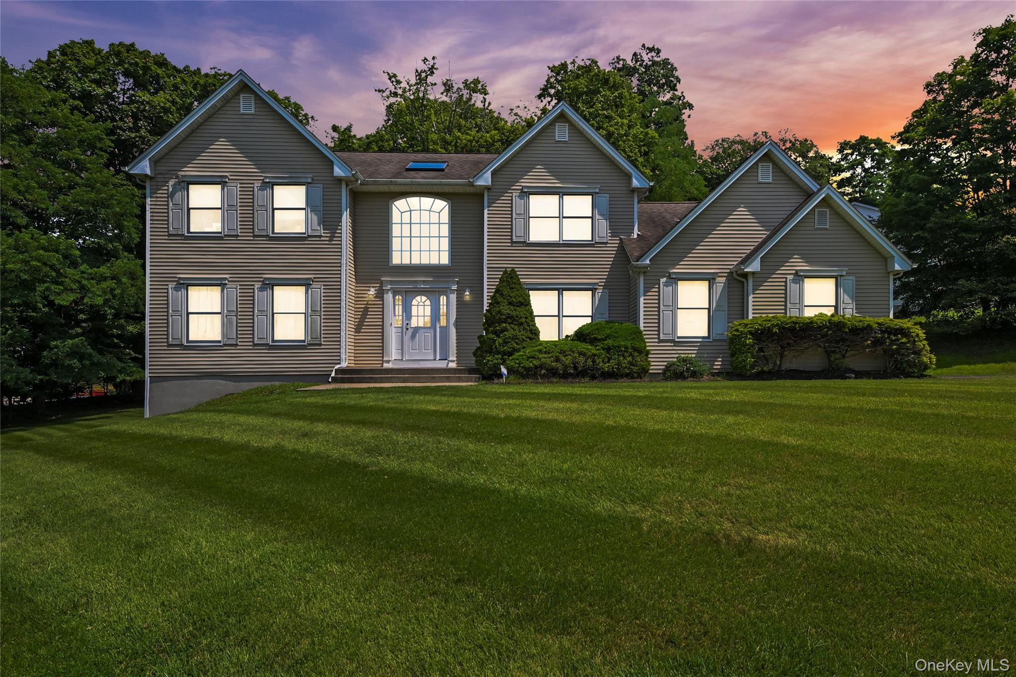 14 Roble Road Suffern, NY 10901 - Photo 2 of 30 Traditional-style house with a front lawn