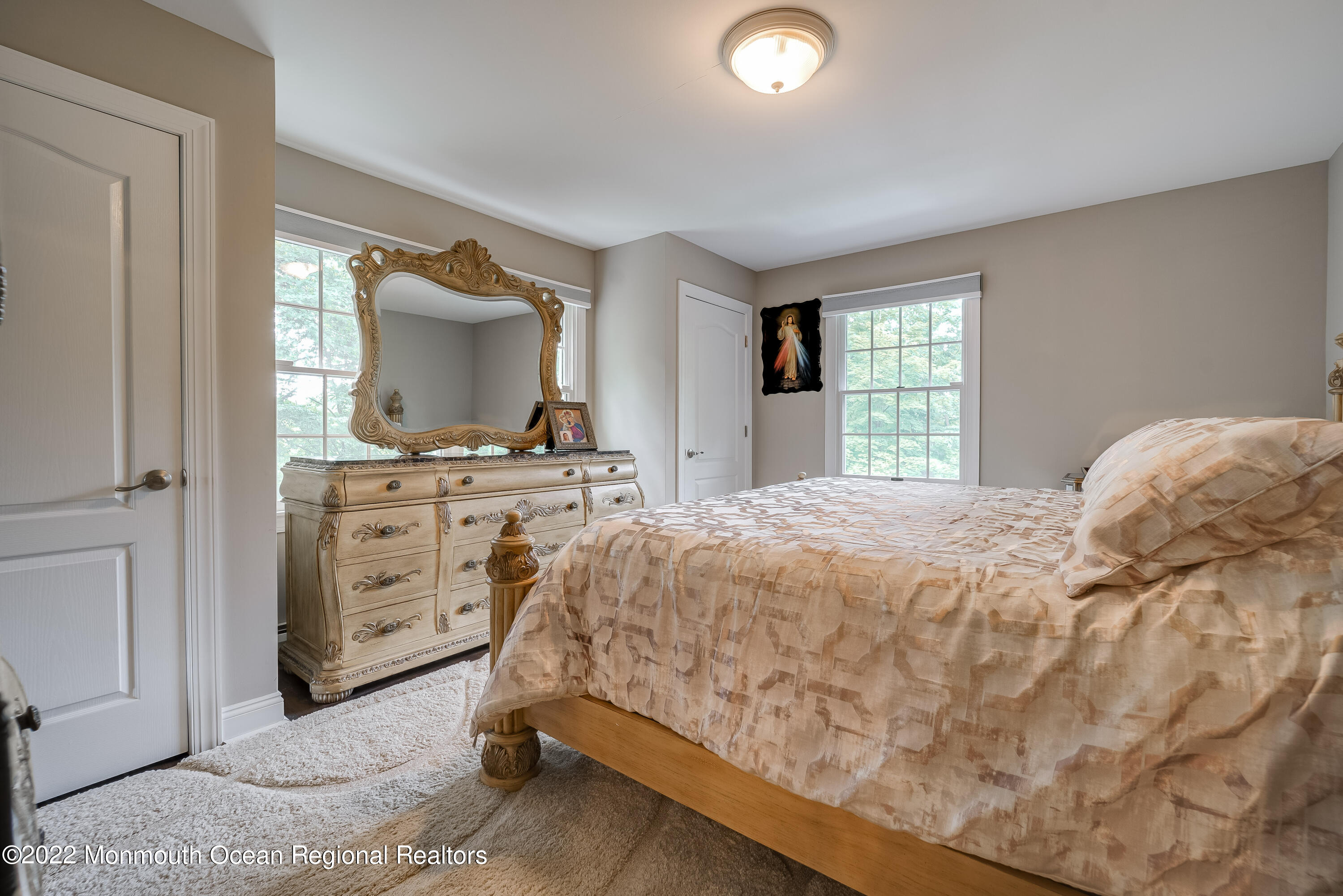 77 Pleasant Hill Road Randolph, NJ 07869 - Photo 46 of 85 a bedroom with a bed and a mirror on dresser