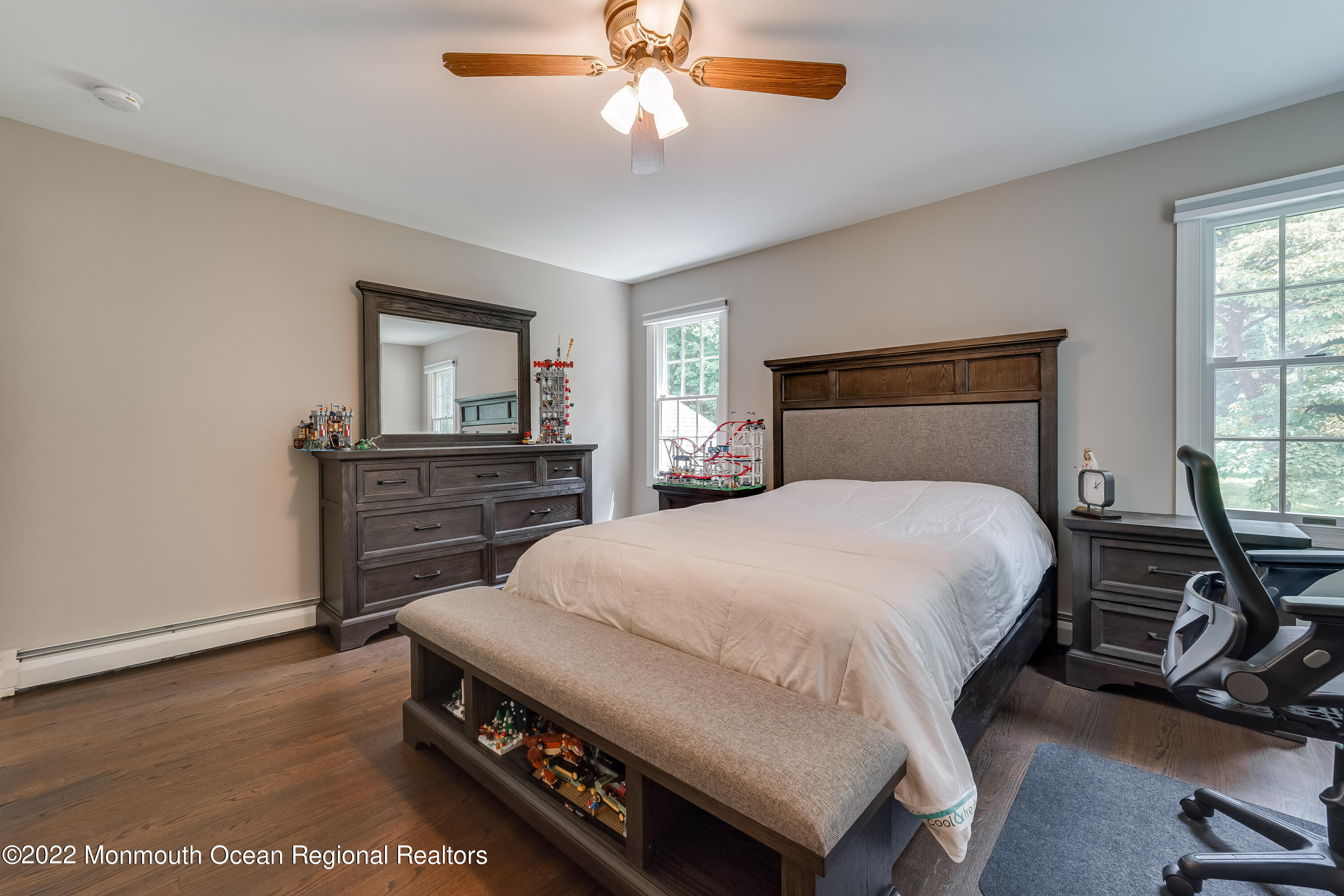 77 Pleasant Hill Road Randolph, NJ 07869 - Photo 54 of 85 a bedroom with a bed a dresser and potted plants