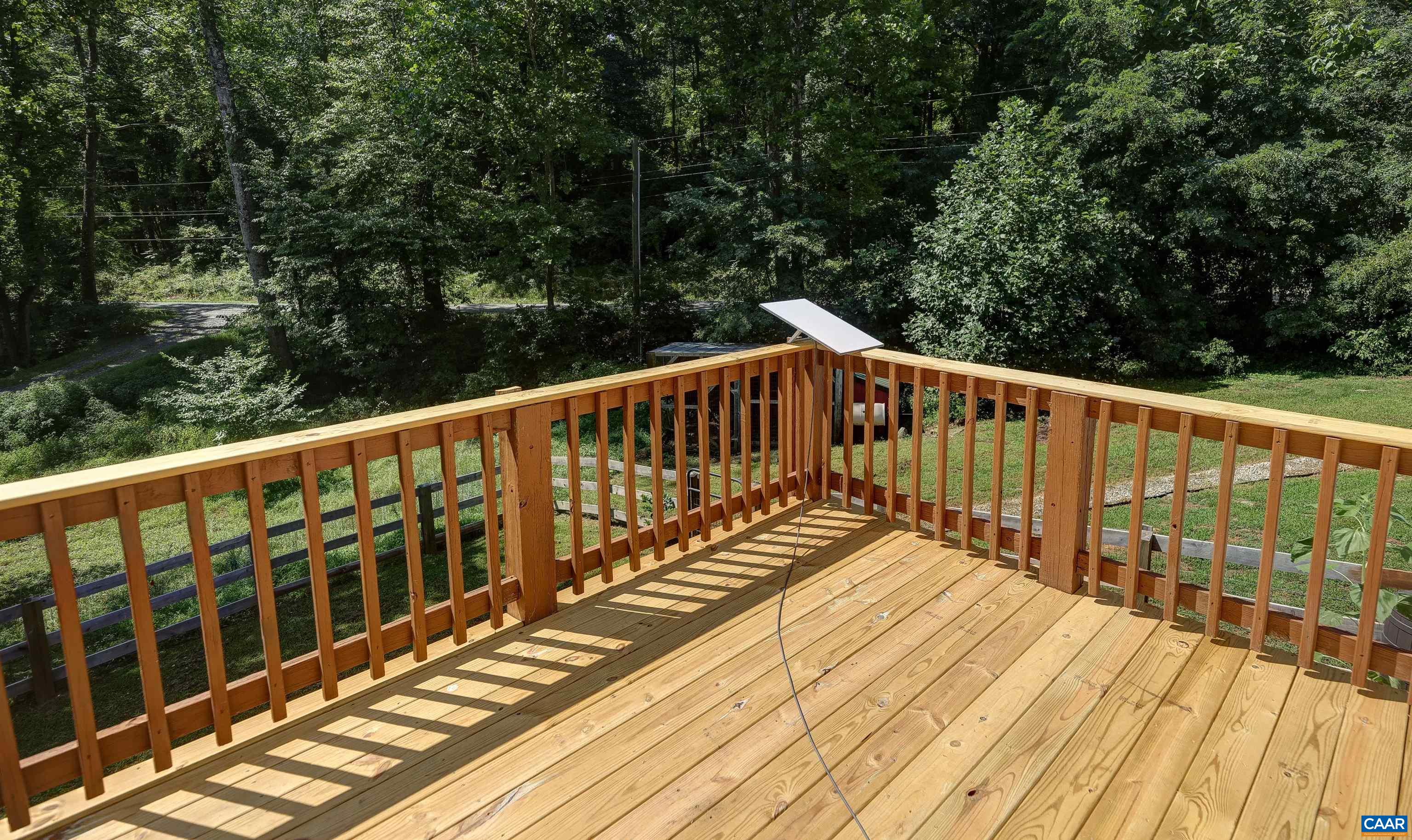 14 High View Road Stanardsville, VA 22973 - Photo 12 of 41 a view of balcony with wooden floor and fence