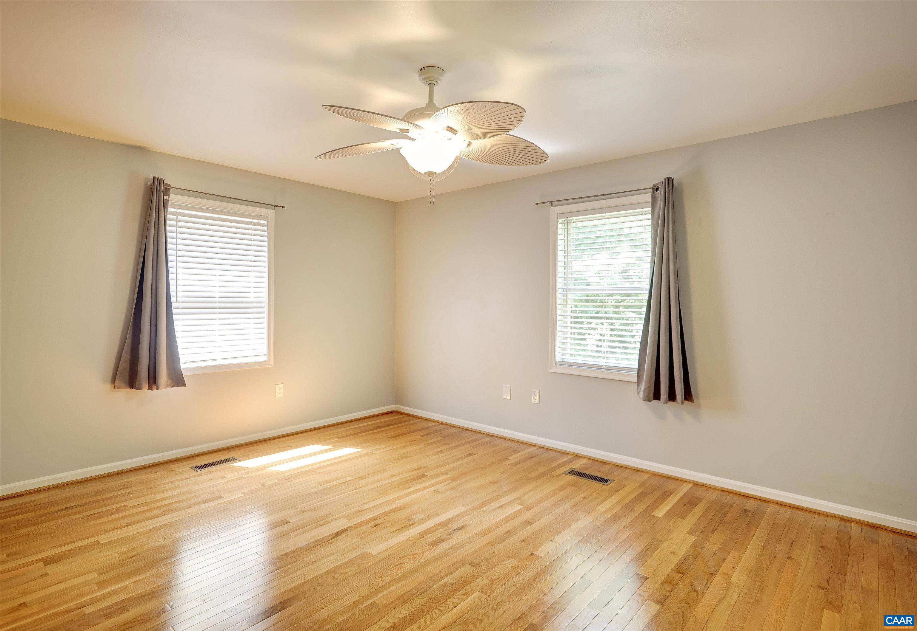 14 High View Road Stanardsville, VA 22973 - Photo 13 of 41 a view of an empty room with wooden floor and a window