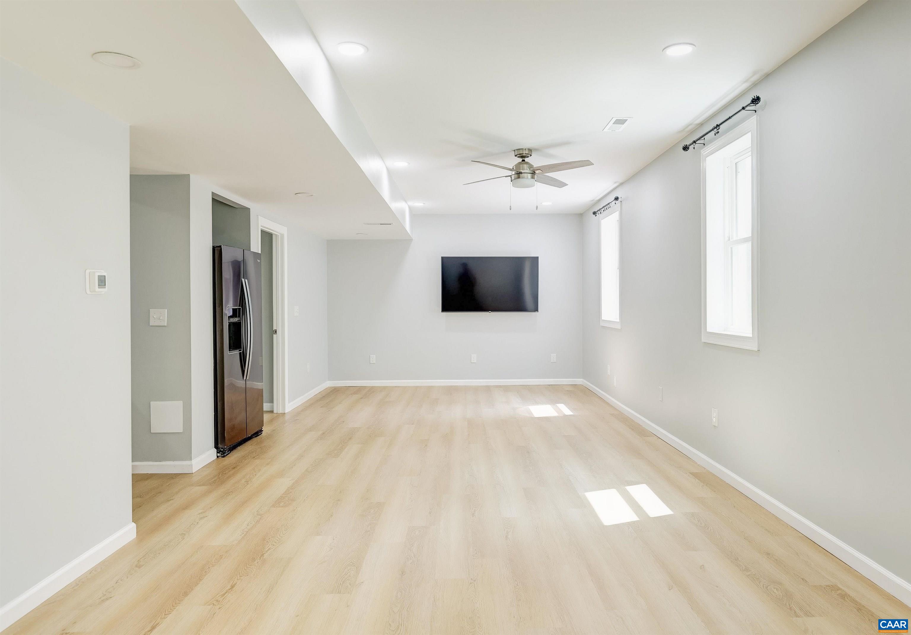 14 High View Road Stanardsville, VA 22973 - Photo 22 of 41 a view of empty room with wooden floor and fan