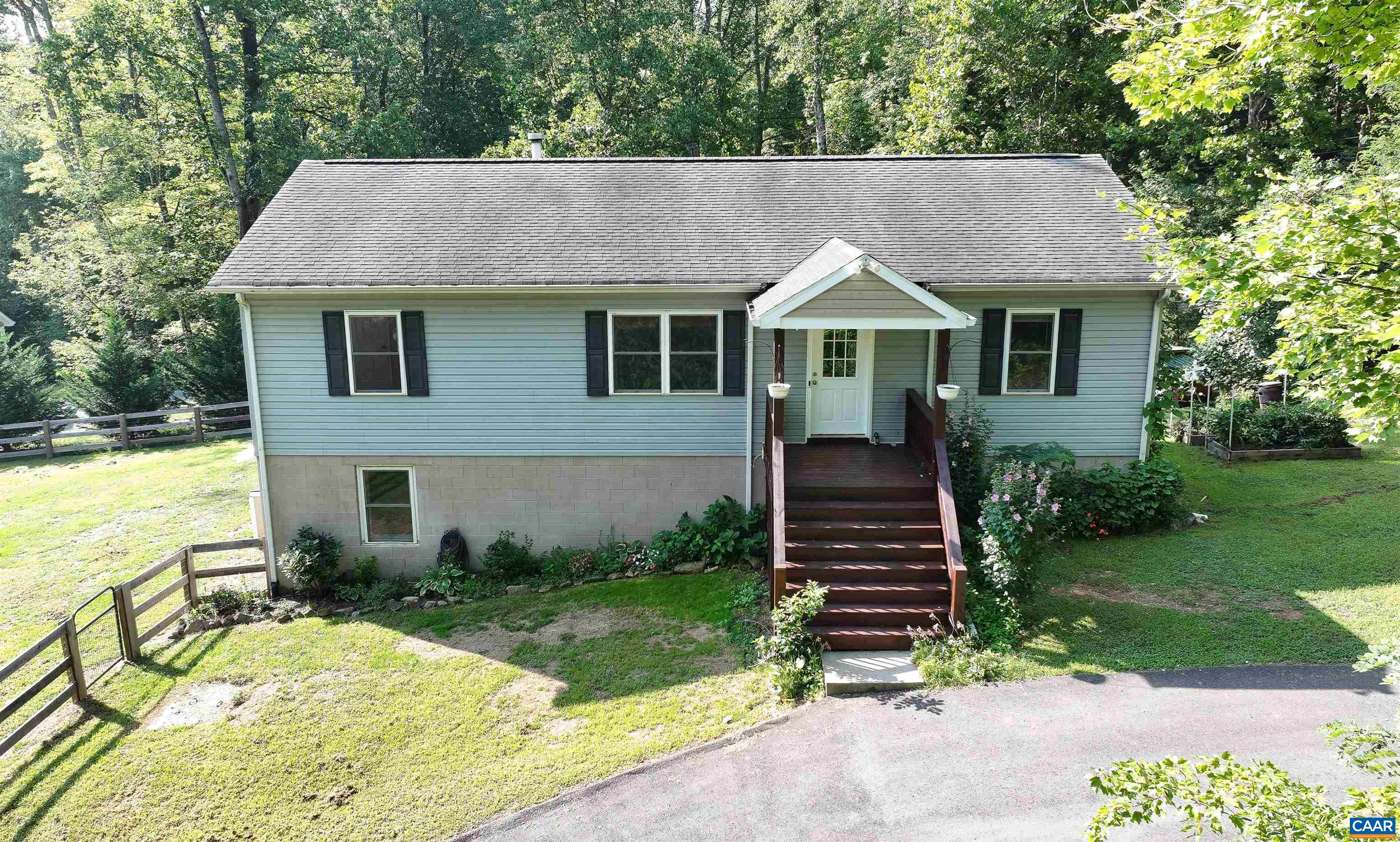 14 High View Road Stanardsville, VA 22973 - Photo 3 of 41 a front view of a house with garden