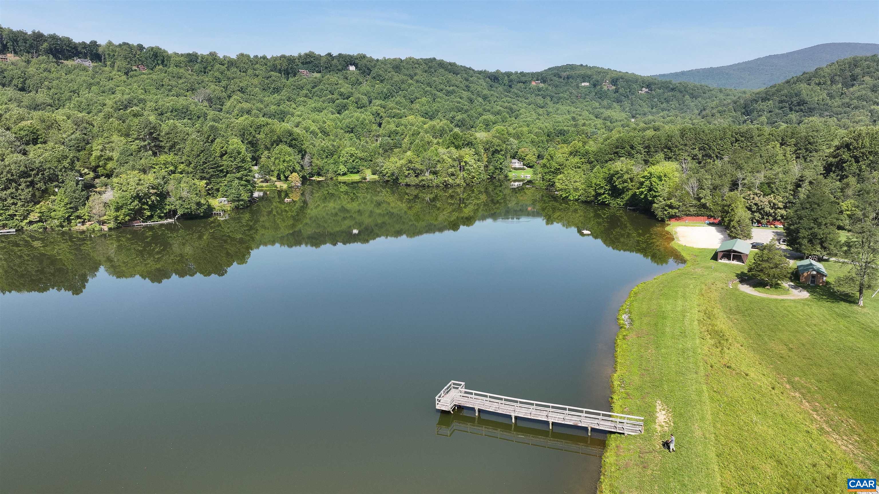 14 High View Road Stanardsville, VA 22973 - Photo 40 of 41 a view of a lake with a mountain in the background